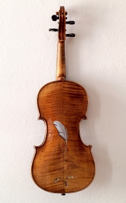 “Absolute: Thread”: Oil paint on reclaimed violin and case. 24” x 8 1/8” x 3 3/4”.
